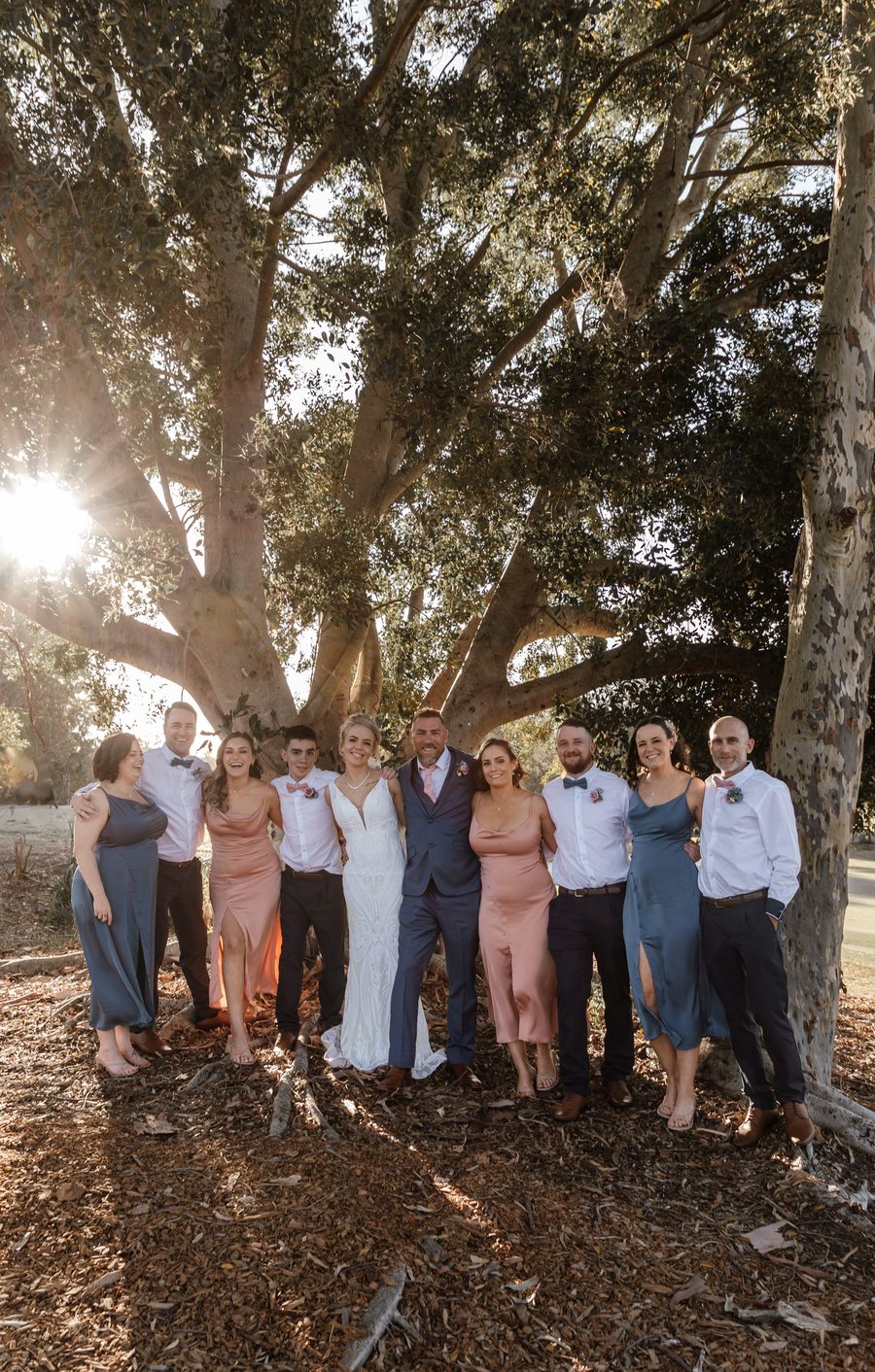 A Bridal party beneath a huge Gum Tree on a Golf Course - Australian wedding photography