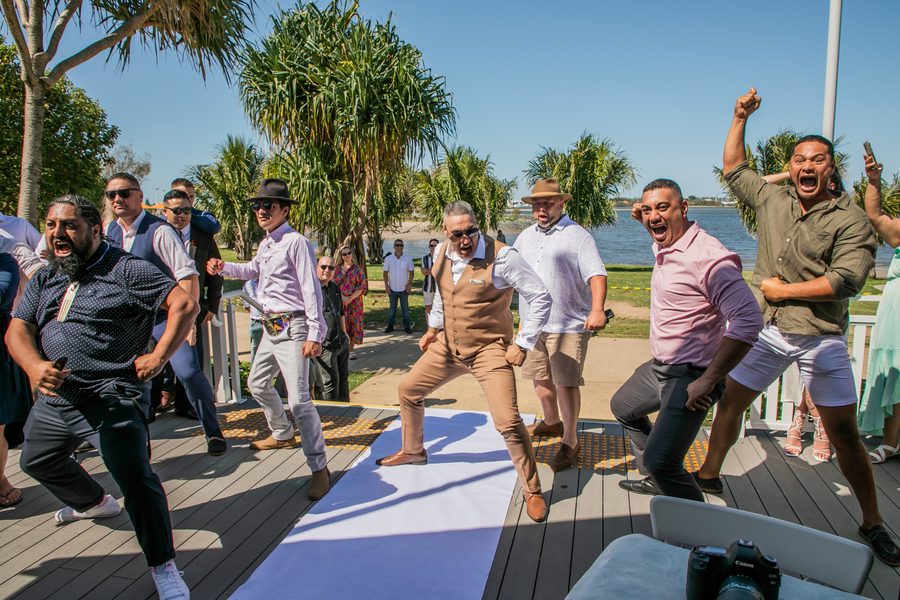 A group of Kiwi's performing a Haka at a wedding