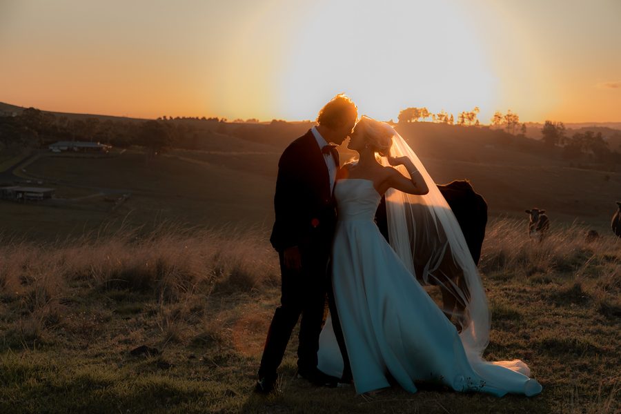 A couple kissing against the setting sun - Anima Visual, Wedding photography in the Gold Coast