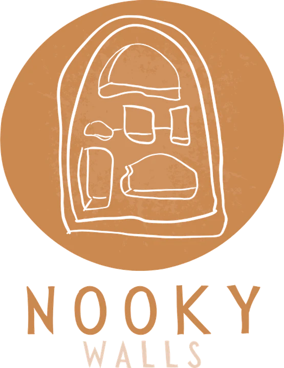 Hand-drawn logo for Nooky Walls: a rough-drawn arched shelf on a terracotta circle